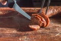 Sliced Ã¢â¬â¹Ã¢â¬â¹smoked calabrese sausage in a wooden table,copy space